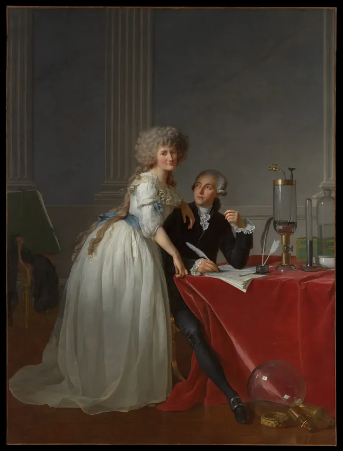 Pintura: um homem de casaca escura, sentado à mesa coberta de veludo vermelho, escreve com uma pena e ergue o olhar para a mulher de vestido branco que se apoia no seu ombro e olha de frente; sobre a mesa e no chão, frascos, tubos e balões de vidro de laboratório.